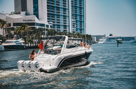 Luxury Yacht Rental Miami by Yacht Scarlet Charters cruising past the Miami skyline during a private sightseeing charter on Biscayne Bay